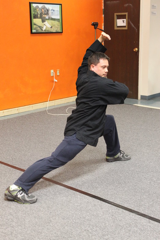 Traditional Northern Shaolin Upper Circular Block and Stick Punch in Reverse Bow Stance