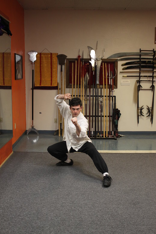 Traditional Northern Shaolin Upper Circular Block and Vertical Punch in 40/60 Posture