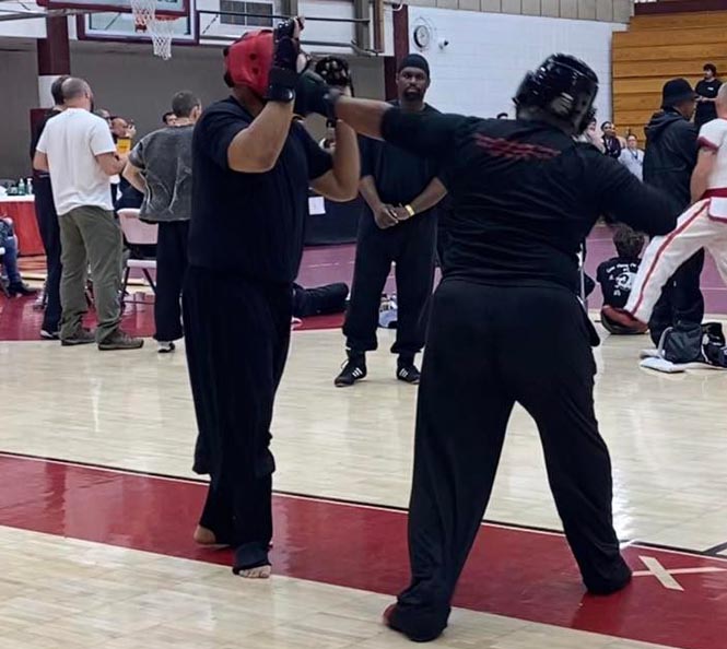 Martial arts practice session focused on mastery and growth.