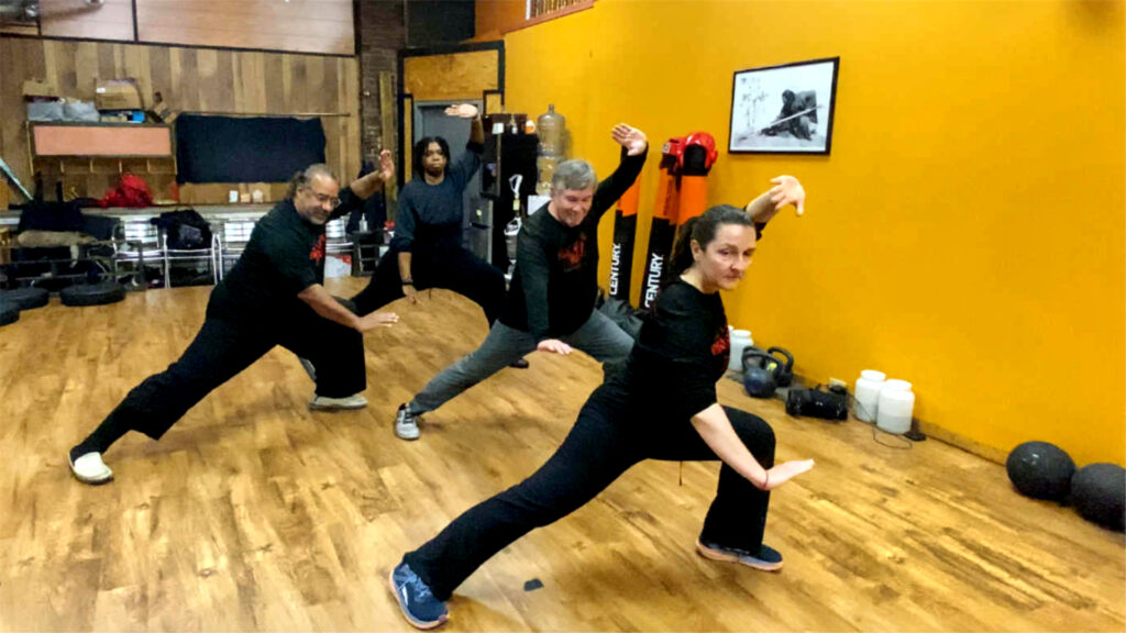 Adult martial arts students training together at Black Mountain Spirit Kung Fu school Pittsburgh.
