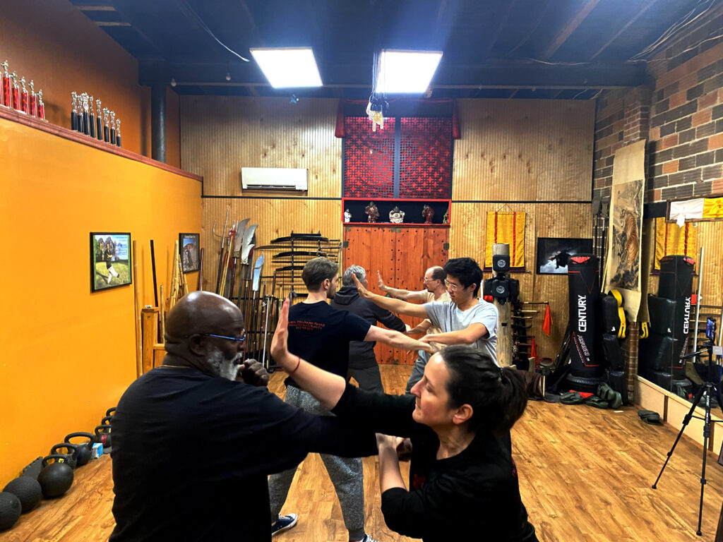 Kung Fu students practicing breathing and balance exercises at Black Mountain Spirit Pittsburgh.