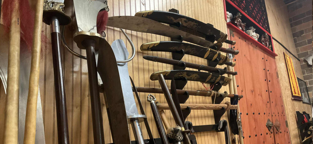 Authentic Shaolin and Tai Chi lineage training weapons representing Chinese martial arts heritage in Pittsburgh.