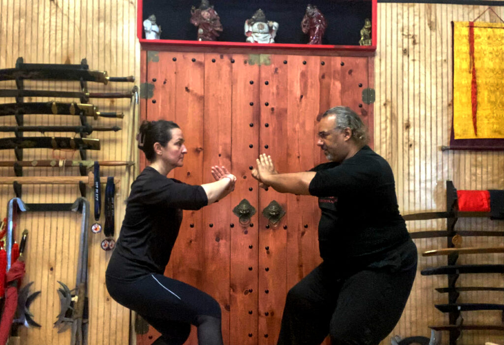 Kung Fu and Tai Chi students meditating after class at Black Mountain Spirit martial arts school Pittsburgh.