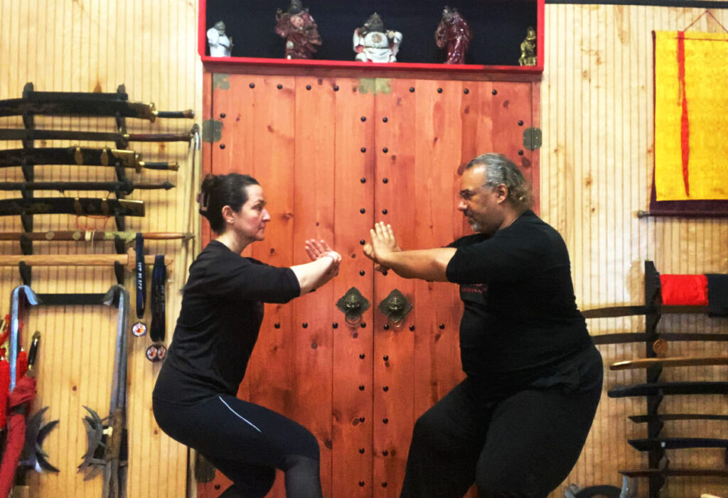 Martial arts students bowing - saluting - in respect at Black Mountain Spirit Kung Fu school Pittsburgh.